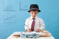 Young boy, counting money and taking notes Royalty Free Stock Photo