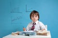 Young boy, counting money and taking notes Royalty Free Stock Photo