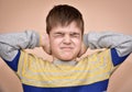 Young boy covering his ears with hands Royalty Free Stock Photo