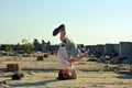 Young boy dancing break dance on the street