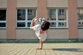 Young boy dancing break dance on the street Royalty Free Stock Photo