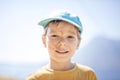 Young boy with with dirty smudges on face after playing outdoors