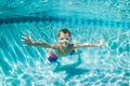 Young Boy Diving Underwater in Swimming Pool Royalty Free Stock Photo