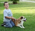 Young boy with dog Royalty Free Stock Photo