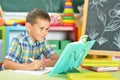 Young boy doing homework Royalty Free Stock Photo