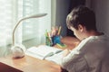 Young boy doing homework or learning at home Royalty Free Stock Photo