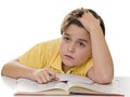 Young boy dreaming at homework Royalty Free Stock Photo