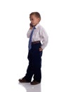 Young boy dressed as businessman with mobile phone Royalty Free Stock Photo