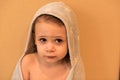 Young boy dries off after a bath