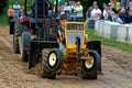 A Young Boy Drives at a Lawn Tractor Pull