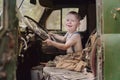 Young boy driving truck Royalty Free Stock Photo