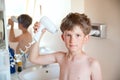 Young boy drying hair Royalty Free Stock Photo