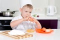 Young boy earning to be a chef Royalty Free Stock Photo