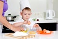 Young boy earning to be a chef Royalty Free Stock Photo