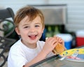 Young boy eating hot dog Royalty Free Stock Photo