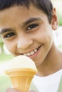 Young boy eating ice cream cone Royalty Free Stock Photo