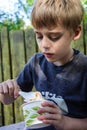 Young Boy Eating Ice Cream Vertical Layout