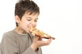 A young boy eating pizza Royalty Free Stock Photo