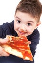 A young boy eating pizza Royalty Free Stock Photo