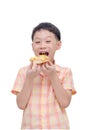 Young boy eating pizza over white Royalty Free Stock Photo