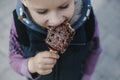 Young boy eating waffles for breakfast. Belgian waffles Royalty Free Stock Photo