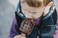 Young boy eating waffles for breakfast. Belgian waffles Royalty Free Stock Photo