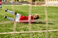 A young boy energetically plays soccer Royalty Free Stock Photo