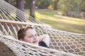 Young Boy Enjoying A Day in His Hammock Royalty Free Stock Photo