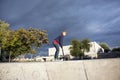 Young boy enjoys skating with a scooter Royalty Free Stock Photo