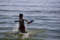 Young boy enjoys the water and sand on a Black Sea beach during the Covid-19 outbreak during  during a summer day morning Royalty Free Stock Photo