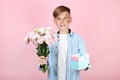 Young boy with eustoma flowers Royalty Free Stock Photo