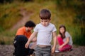 Young Boy Exploring Outdoors with Family Royalty Free Stock Photo