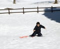Young boy falls with the cross country skiing Royalty Free Stock Photo