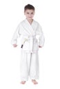 A young boy fighter in white kimono Royalty Free Stock Photo