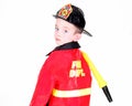 Young boy in fireman costume Royalty Free Stock Photo