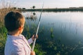 Young boy with fishing pole Royalty Free Stock Photo