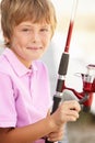 Young boy with fishing rod Royalty Free Stock Photo