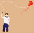 Young boy flying kite