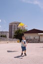 Young boy flying kite on a sunny day Royalty Free Stock Photo