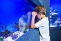 Young boy focusing an algae