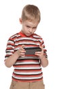 Young boy with a gadget Royalty Free Stock Photo