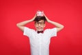 Young boy with gift box on head Royalty Free Stock Photo