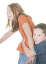 Young boy and girl being physical Royalty Free Stock Photo