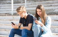 Young boy and girl deep into virtual reality.