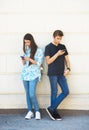 Young boy and girl deep into virtual reality.