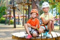 Young boy and girl playing when having fun doing