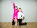 The young boy and girl posing at dance studio Royalty Free Stock Photo