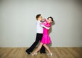 The young boy and girl posing at dance studio Royalty Free Stock Photo