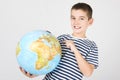 Young boy with globe Royalty Free Stock Photo