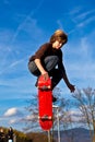 Young boy going airborne with his skateboard Royalty Free Stock Photo